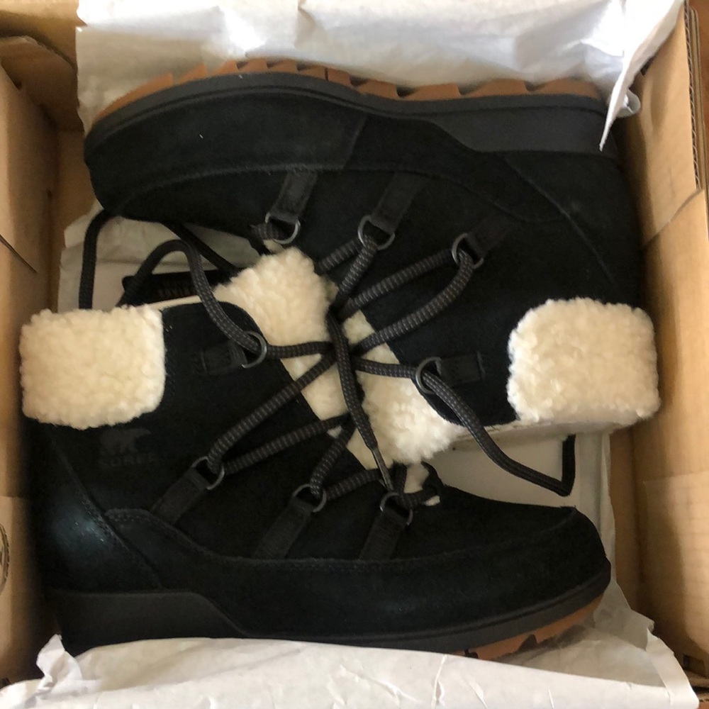 Sorel-Evie cozy lace up winter boots.